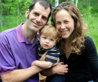 Wendy Wray, her husband and son outside